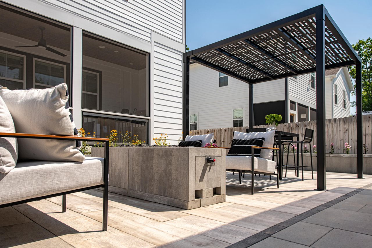 Outdoor livingroom diningroom with pergola and fire feature